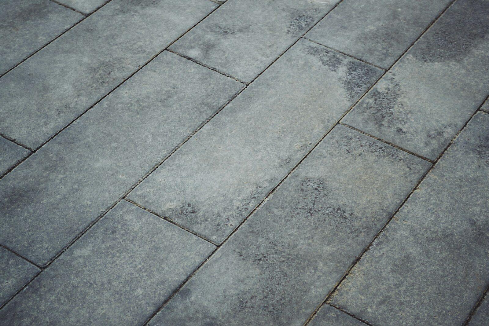 Grey pavement bricks arranged diagonally